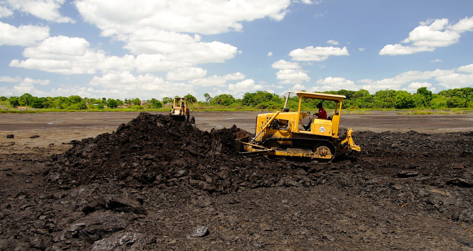 Asphalt mining in the Pitch Lake at La Brea, Trinidad and Tobago